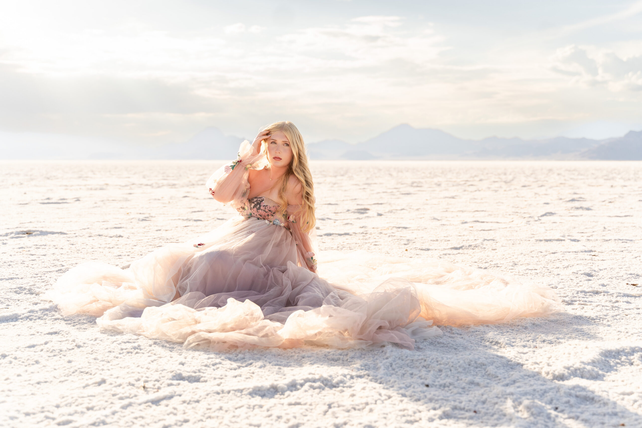 High school senior posing at the Bonneville Salt Flats during a styled photography retreat in Utah
